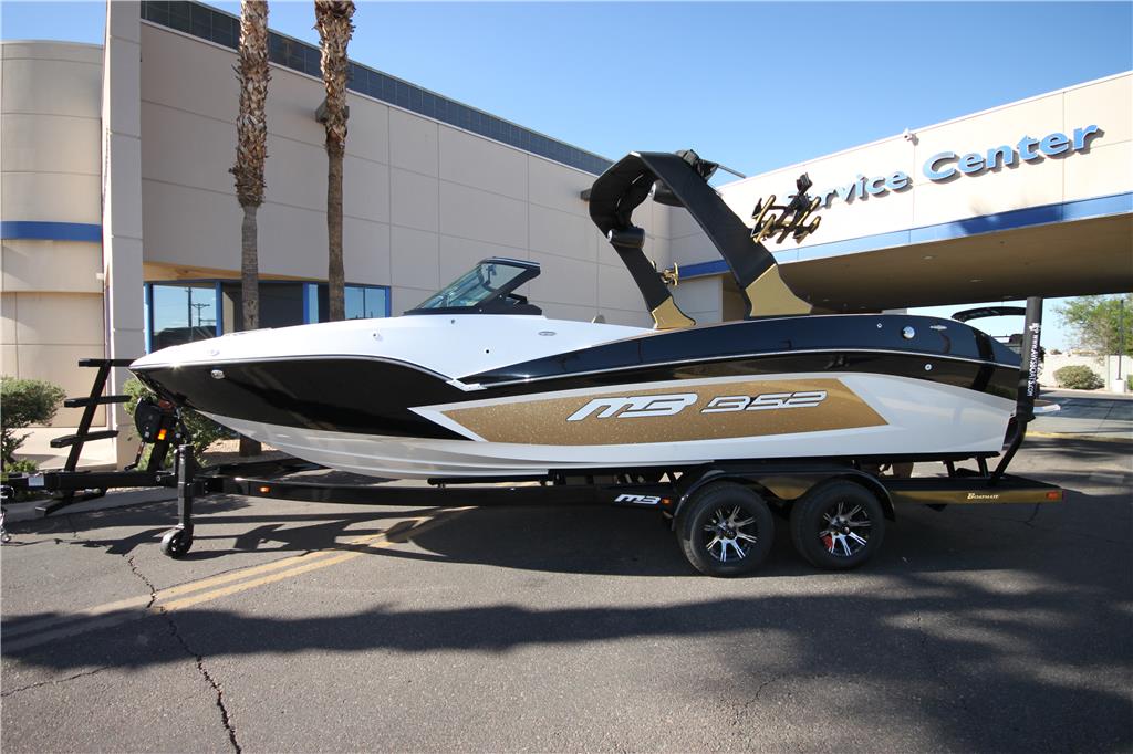 2024 MB Sports B52 23 Alpha – Gold Metal Flake, black, & white