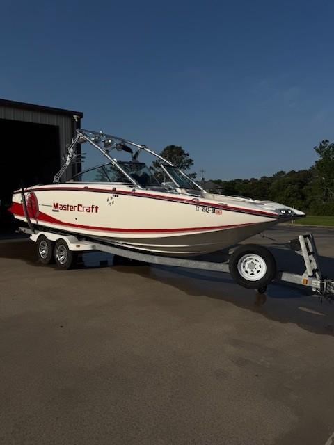 For Sale: 2010 MasterCraft X-55 | 450HP | Tower | Low 102 Hours | Trailer Included – $70,000