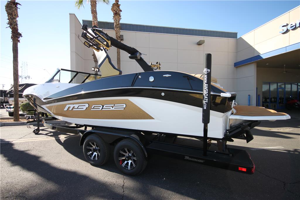 2024 MB Sports B52 23 Alpha – Gold Metal Flake, black, & white
