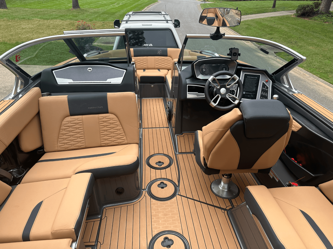 2021 Mastercraft X24 FastFiill, dual screens, 4 tower speakers, low pro trailer, heater, and MORE